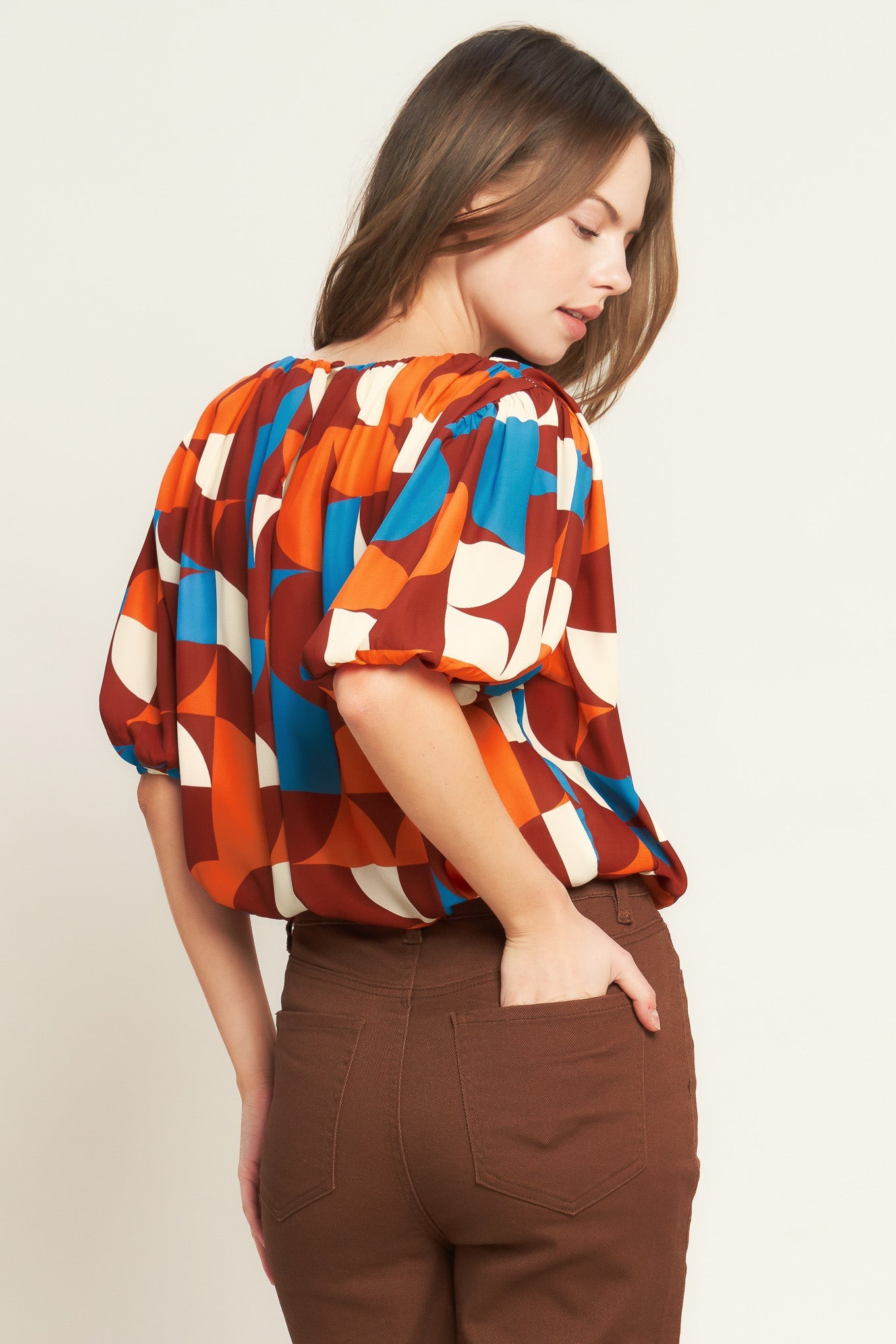 GONE IN A BLINK WOVEN TOP